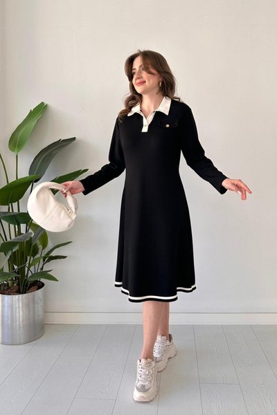 فستان مودال ميدي أسود بأكمام طويلة بياقة بولو وحافة متباينة