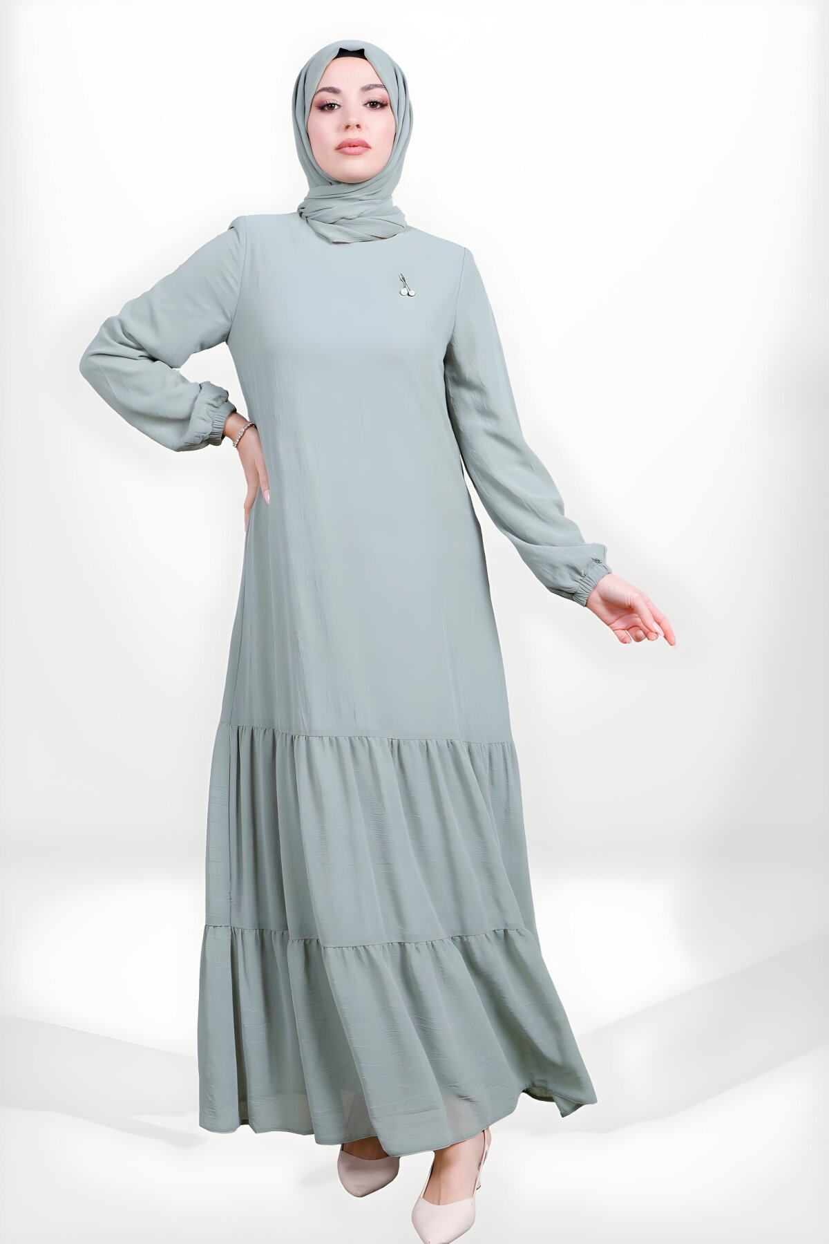 Yeşil Eteği Fırfırlı Kolu Lastikli Elbise Yeşil Eteği Fırfırlı Kolu Lastikli Elbise