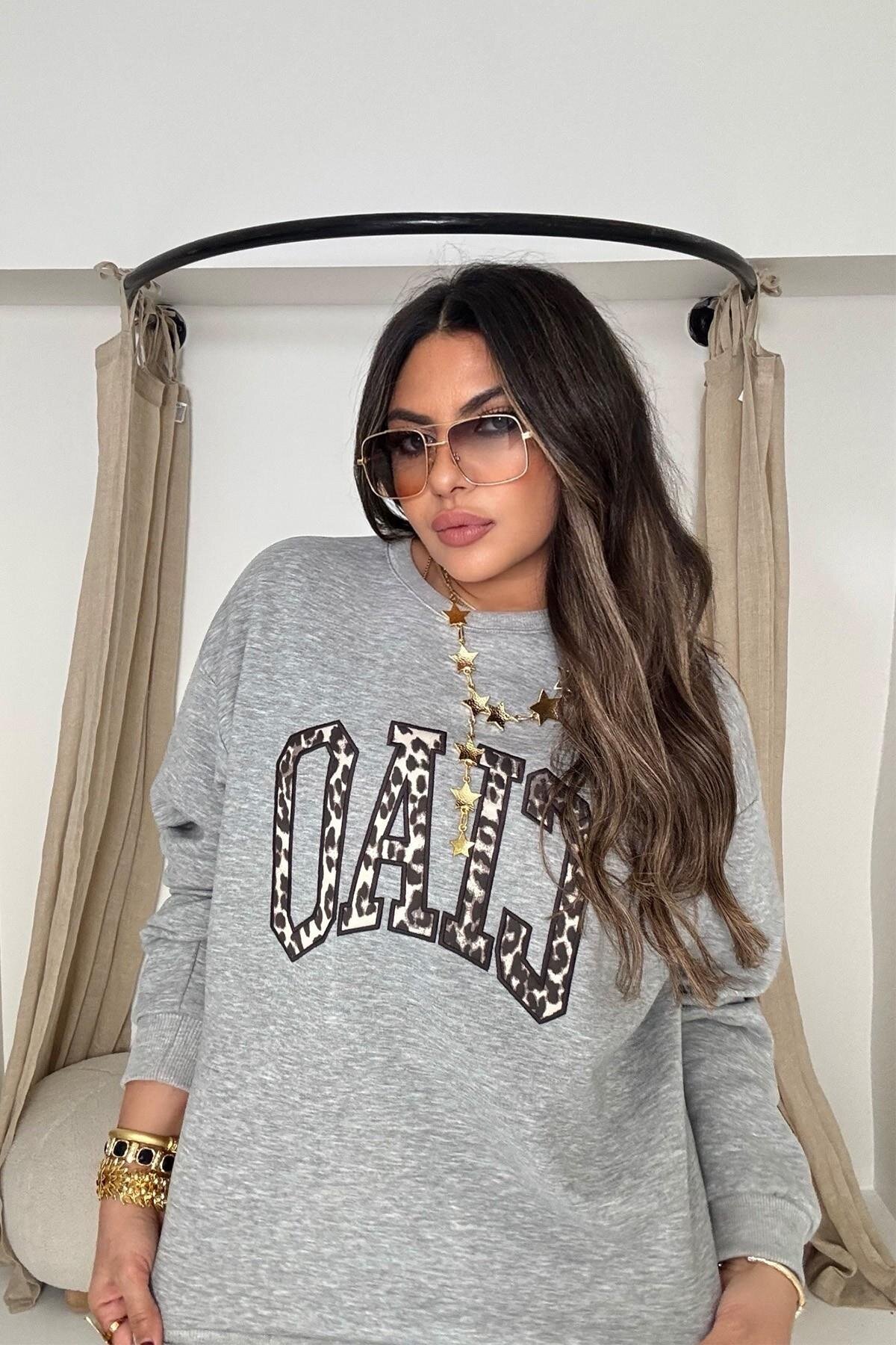 كنزة هودي رمادية بطبعة ليوبارد بتفاصيل Ciao أبليكه - Sohotique By P