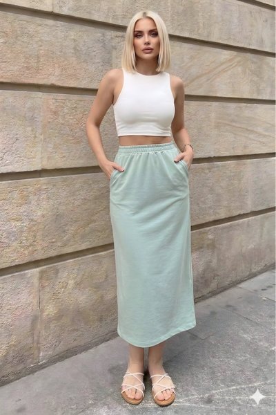 تنورة طويلة رياضية تركواز بخصر مطاطي وجيوب نعناعية